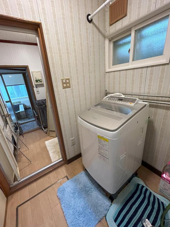 北海道ゲストハウス川湯温泉6丁目の洗濯室